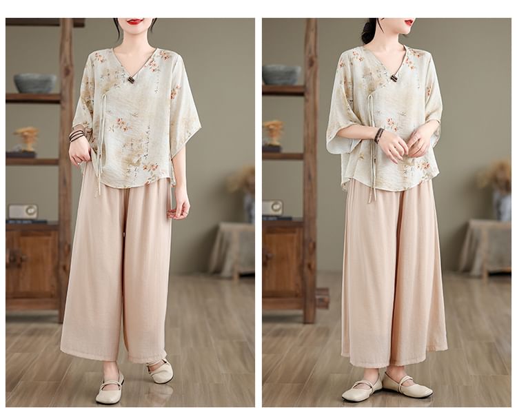 Set: Elbow-Sleeve V-Neck Floral Print Tie Front Wrap Top + High Waist Plain Wide Leg Pants SpreePicky