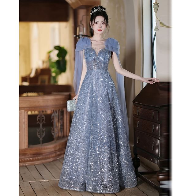 Sleeveless Crew Neck Sequin Sheer Panel Bow Accent A-Line Evening Gown FashionChic